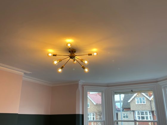 Professional electrician repairing residential electrical system