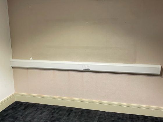 Professional electrician repairing domestic electrical system