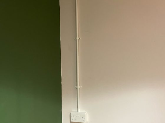 Electrician fixing electrical components