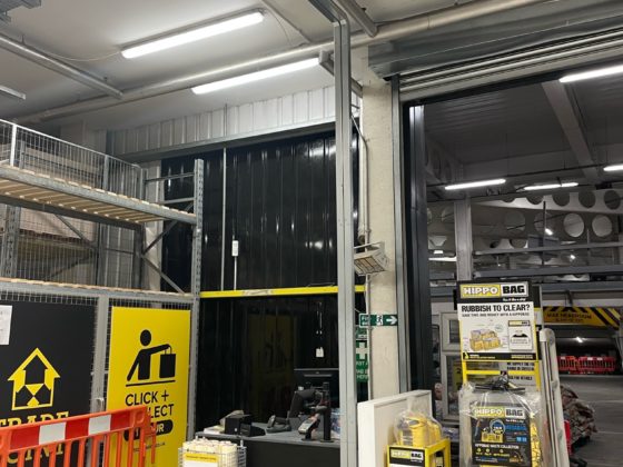 Professional electrician fixing a wall electrical socket