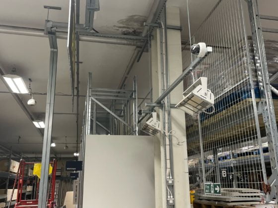 Electrician performing electrical work safely