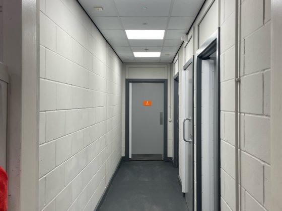 Professional electrician fixing electrical equipment