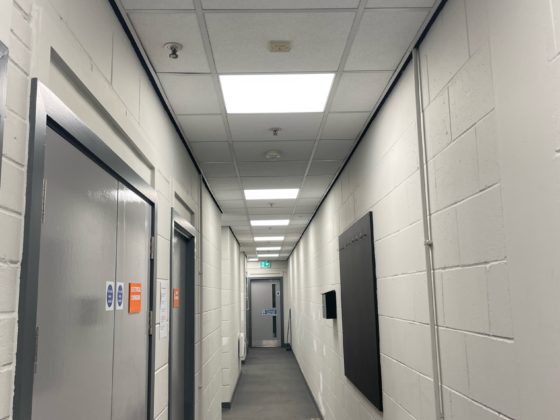 Electrician repairing fuse box