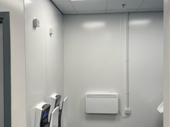 Professional electrician fixing electrical wires