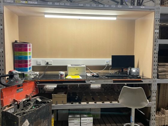 Professional electrician installing a circuit breaker