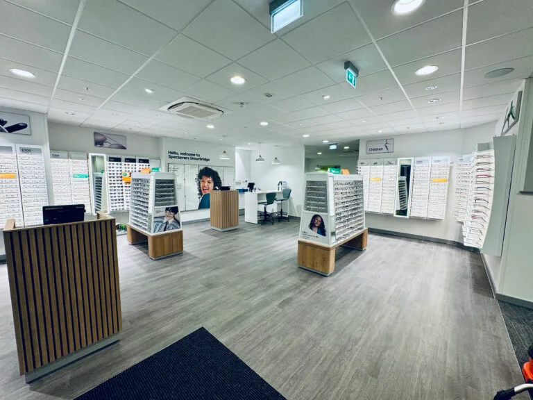 Optician store with glasses display and counters.